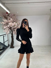 Puff sleeve peplum dress - black